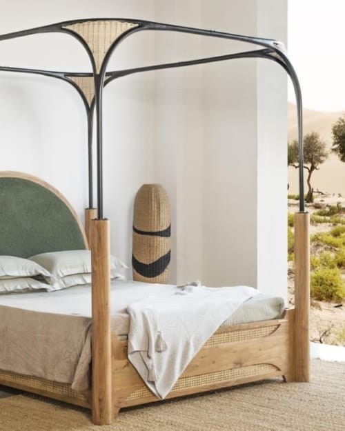 Elegant bed with natural surroundings.